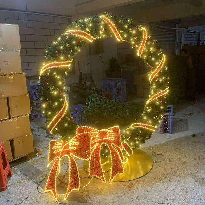 Large illuminated commercial wreath motif photographed in the production area